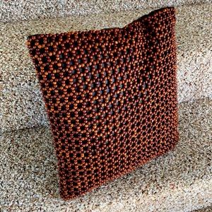 Beaded throw pillow